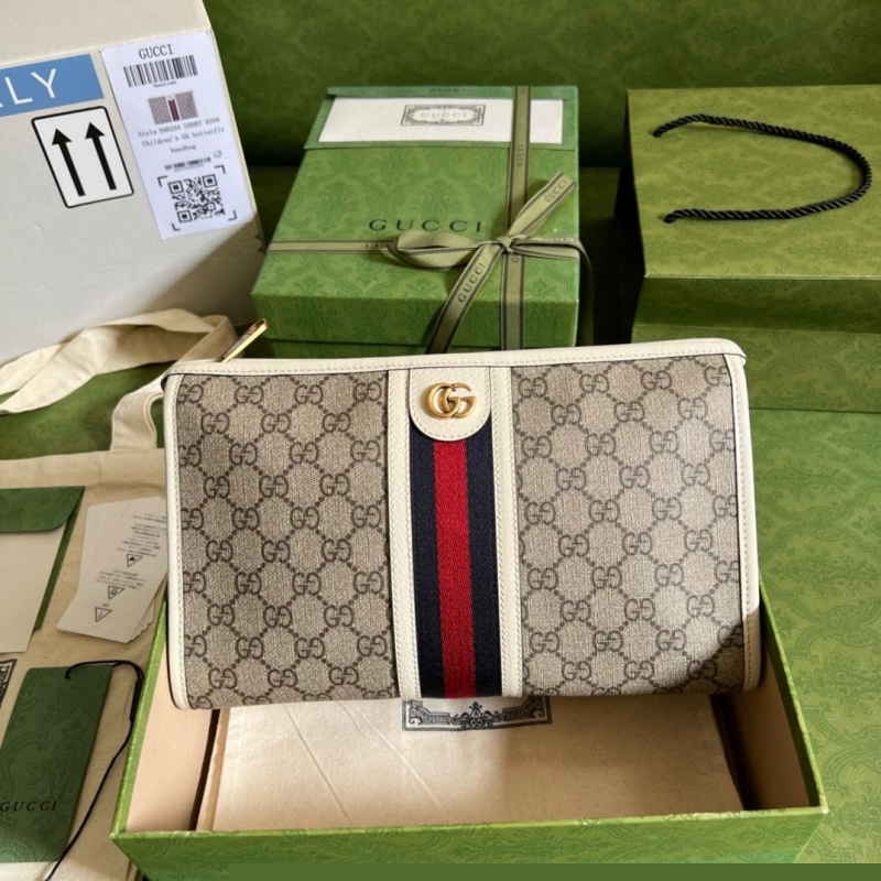 G*u*i clutch bags
